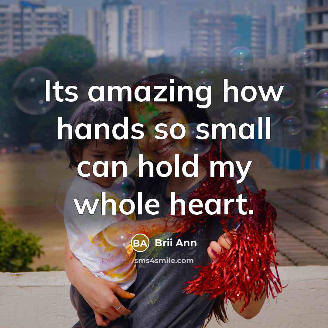 “Its amazing how hands so small can hold my whole heart.” quote by Brii Ann