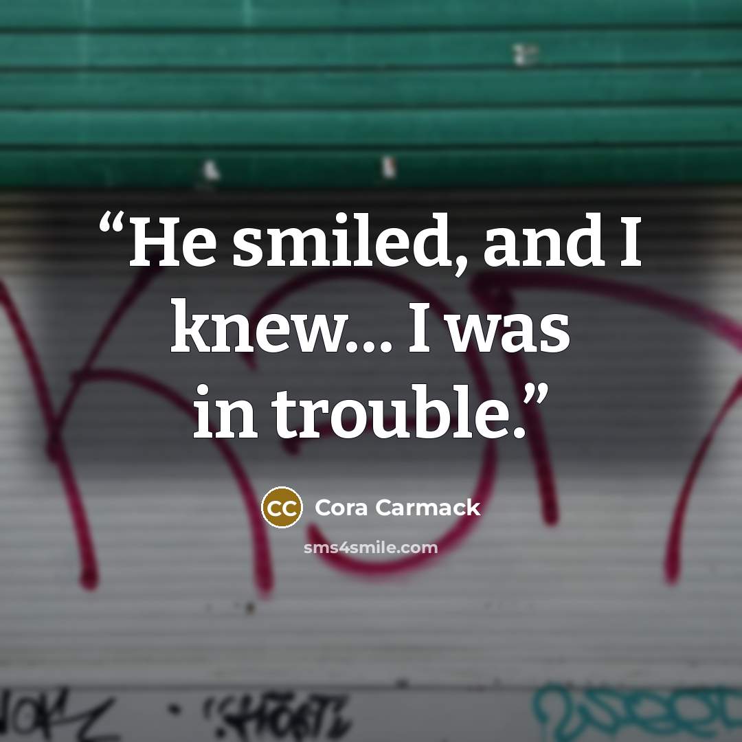 “He smiled, and I knew… I was in trouble.” quote by Cora Carmack