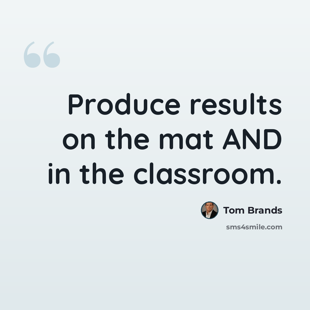 “Produce results on the mat AND in the classroom.” quote by Tom Brands