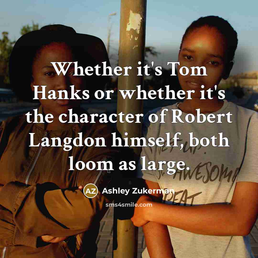 “Whether it's Tom Hanks or whether it's the character of Robert Langdon himself, both loom as large.” quote by Ashley Zukerman