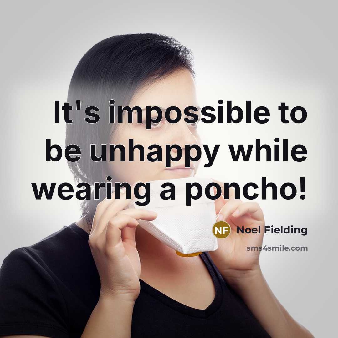 “It's impossible to be unhappy while wearing a poncho!” quote by Noel Fielding
