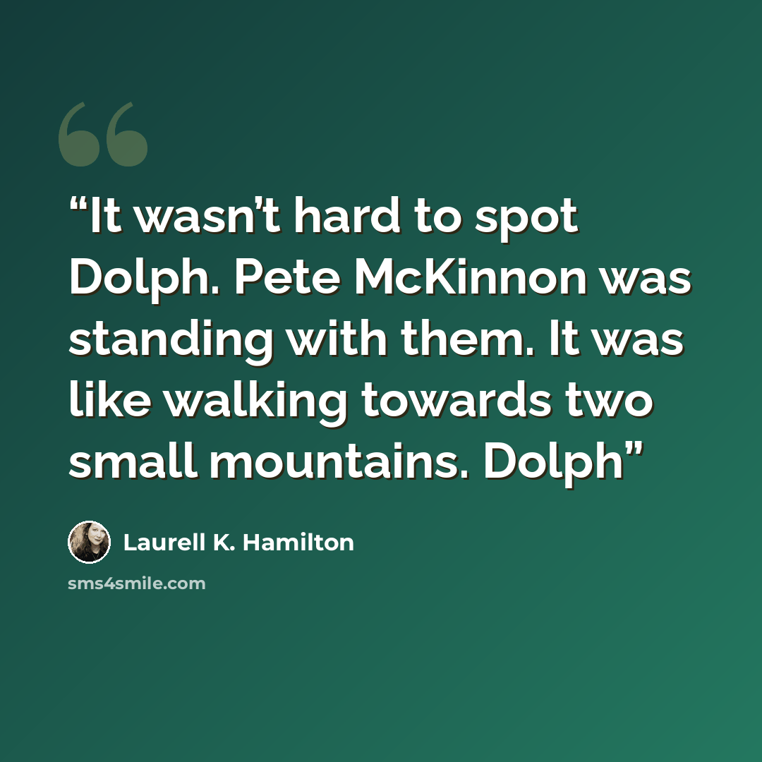 “It wasn’t hard to spot Dolph. Pete McKinnon was standing with them. It was like walking towards two small mountains. Dolph” quote by Laurell K. Hamilton