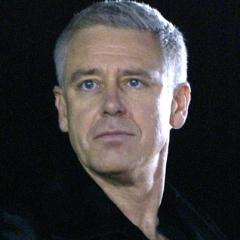 Portrait of Adam Clayton