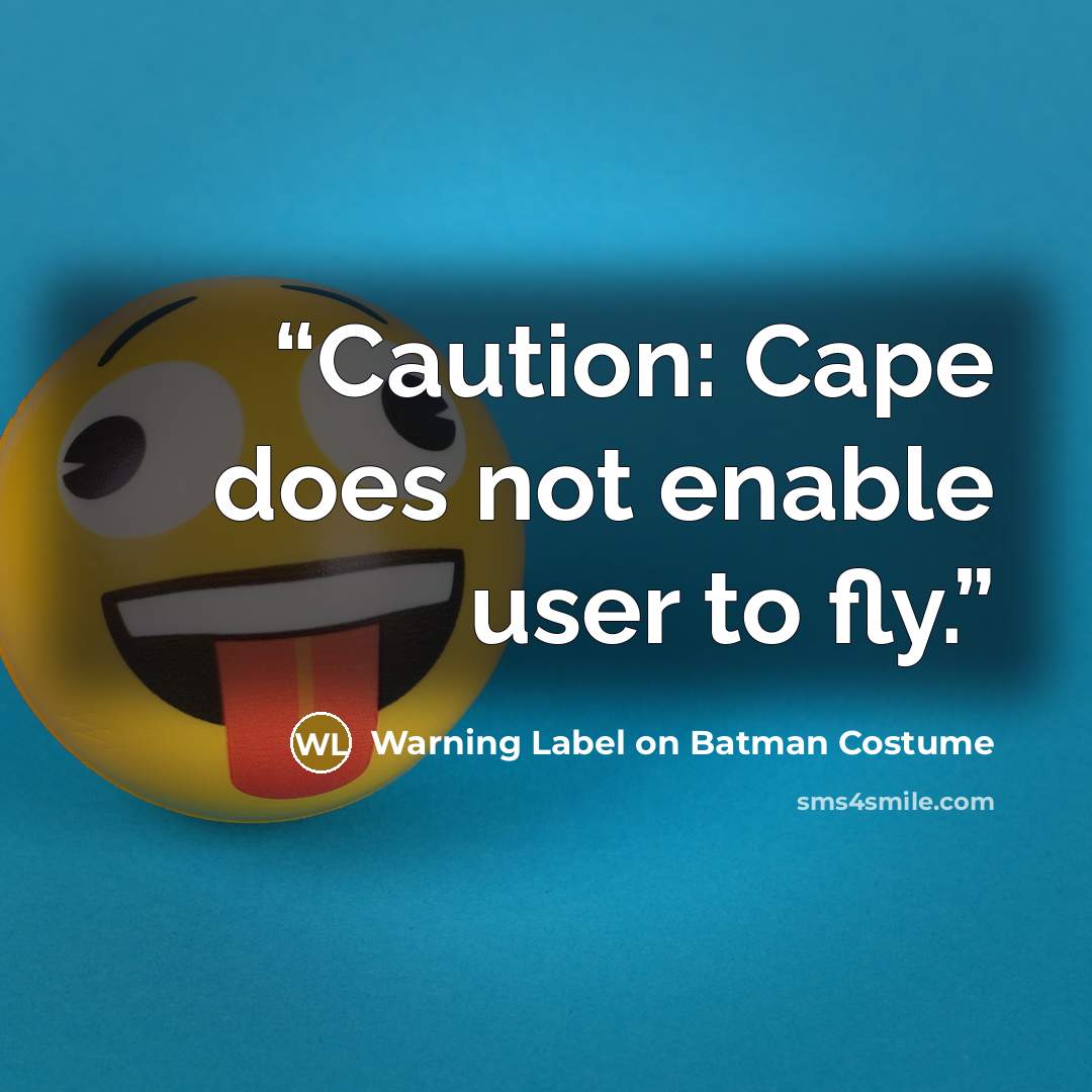 “Caution: Cape does not enable user to fly.” quote by Warning Label on Batman Costume