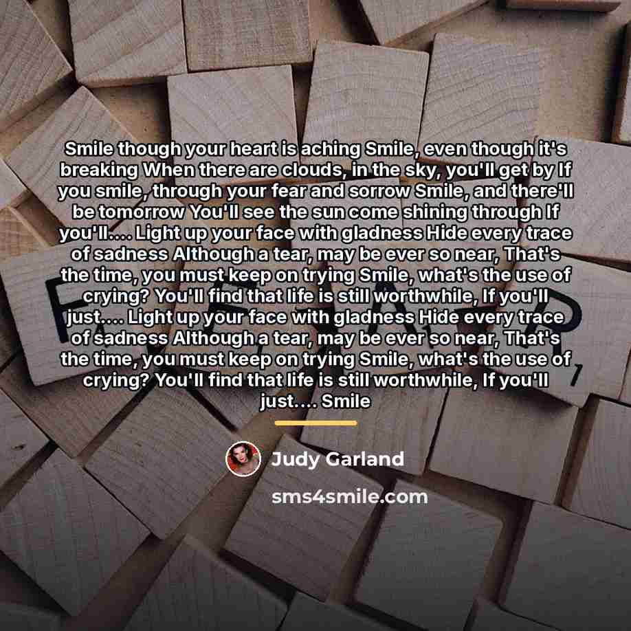 “Smile though your heart is aching Smile, even though it's…” quote by Judy Garland