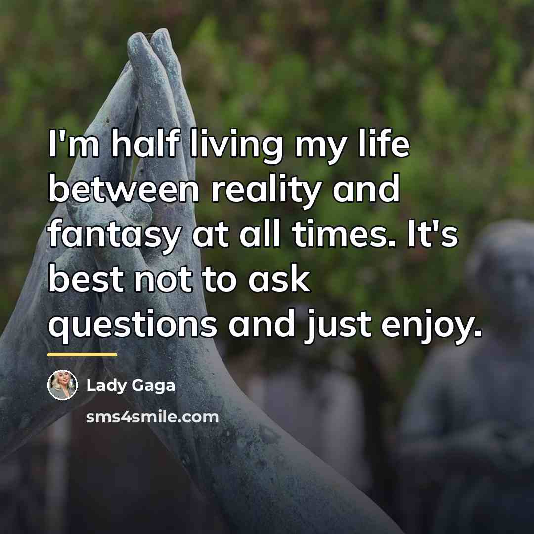 “I'm half living my life between reality and fantasy at…” quote by Lady Gaga
