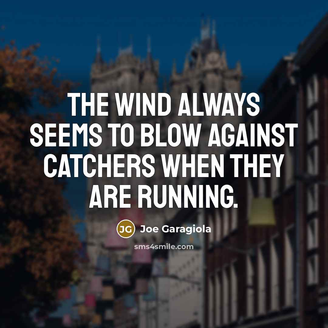 “The wind always seems to blow against catchers when they…” quote by Joe Garagiola