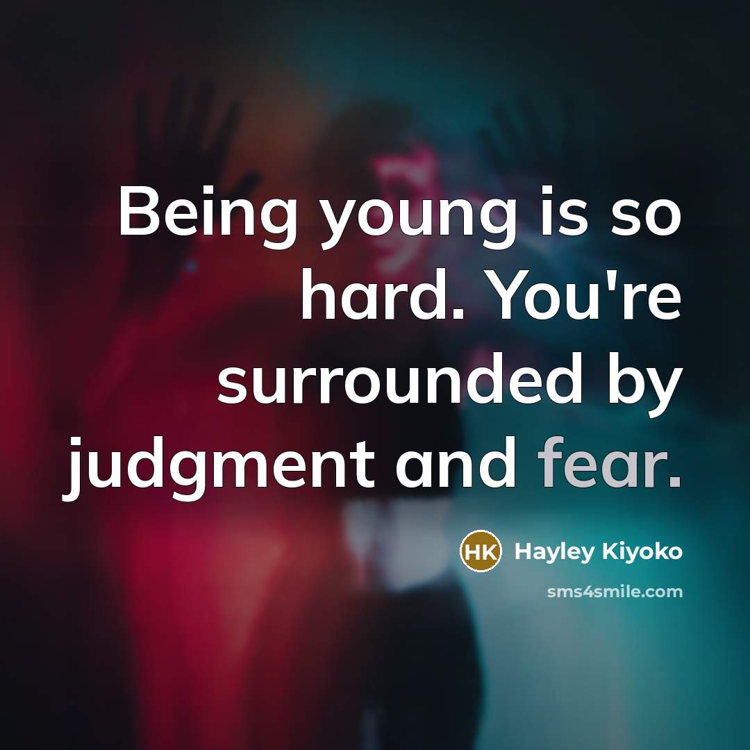 “Being young is so hard. You're surrounded by judgment and…” quote by Hayley Kiyoko