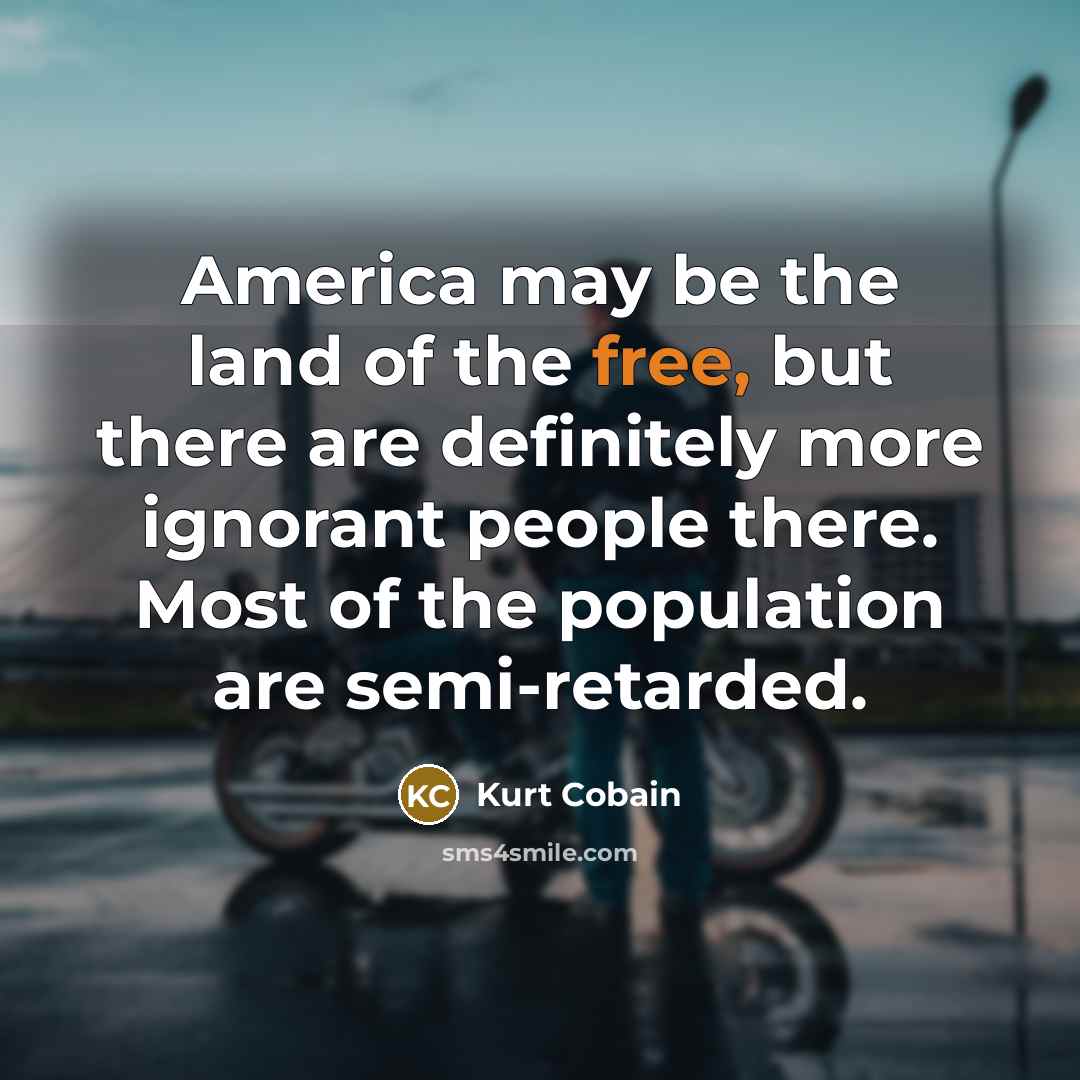 “America may be the land of the free, but there…” quote by Kurt Cobain