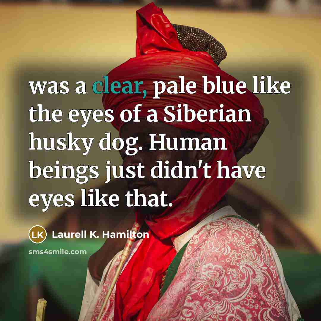 “was a clear, pale blue like the eyes of a…” quote by Laurell K. Hamilton