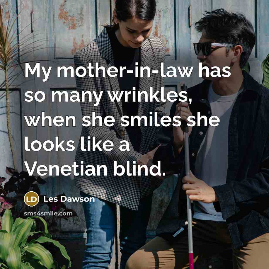 “My mother-in-law has so many wrinkles, when she smiles she…” quote by Les Dawson