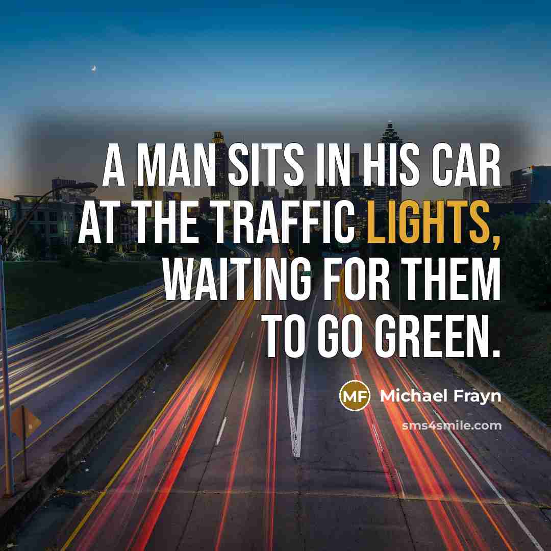 “A man sits in his car at the traffic lights,…” quote by Michael Frayn