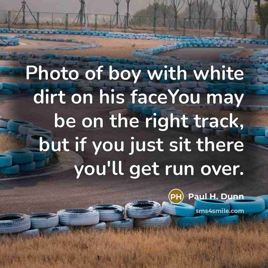 “Photo of boy with white dirt on his faceYou may…” quote by Paul H. Dunn