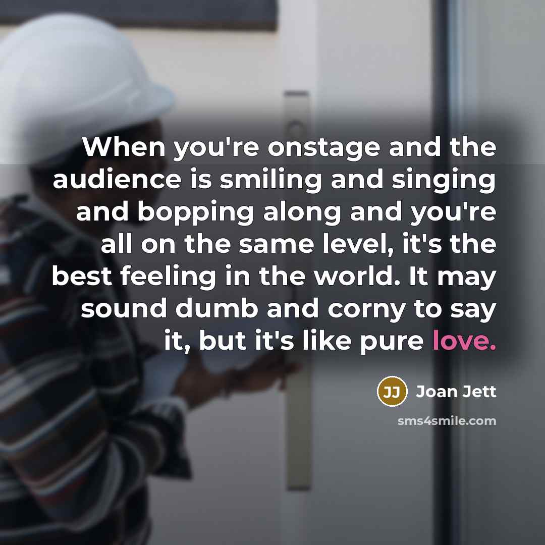 “When you're onstage and the audience is smiling and singing…” quote by Joan Jett