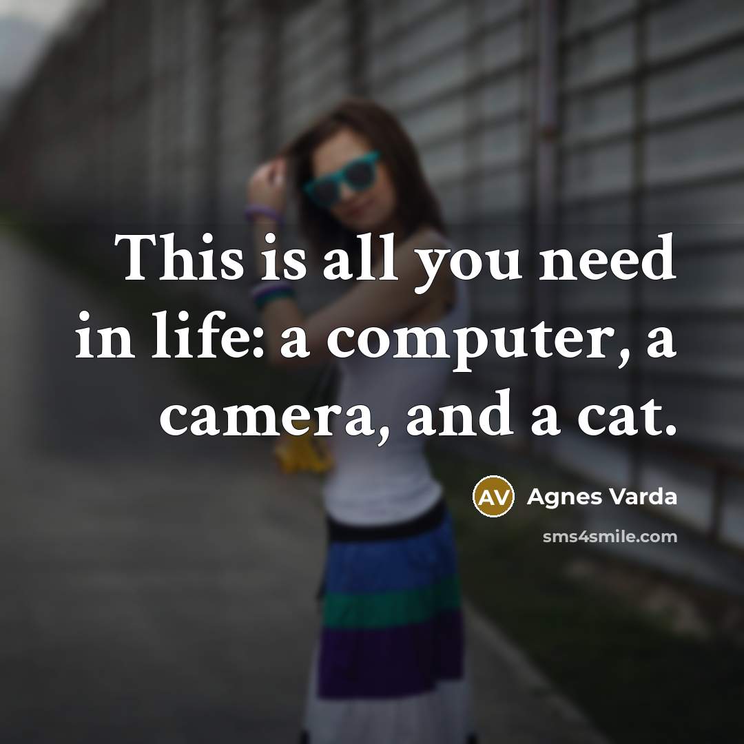 “This is all you need in life: a computer, a camera, and a cat.” quote by Agnes Varda