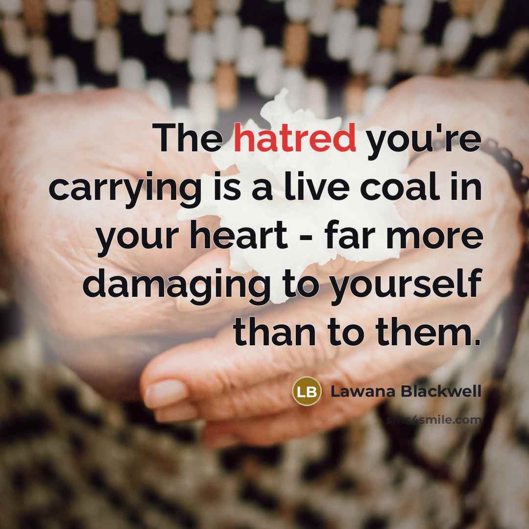 “The hatred you're carrying is a live coal in your…” quote by Lawana Blackwell