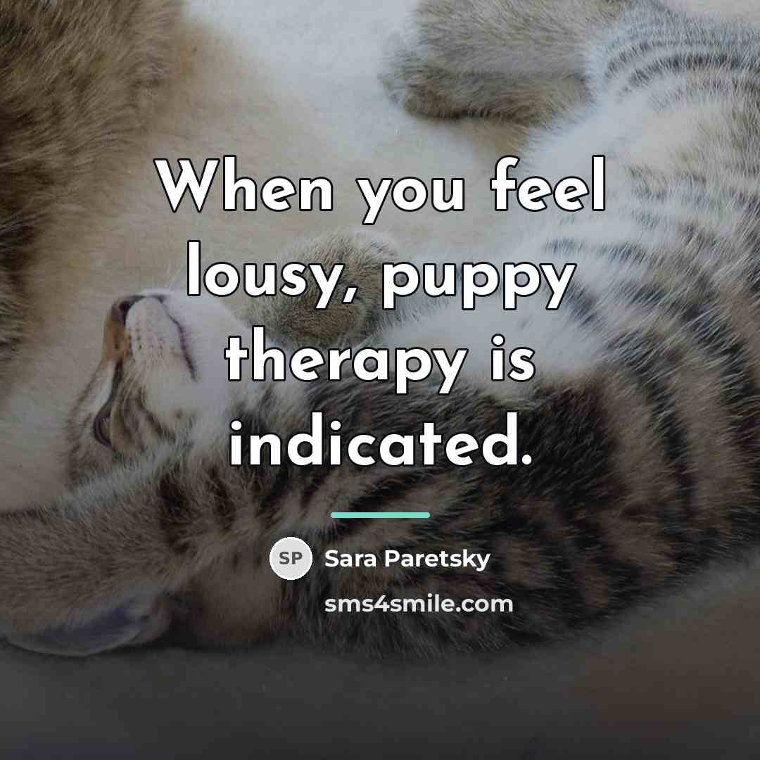 “When you feel lousy, puppy therapy is indicated.…” quote by Sara Paretsky