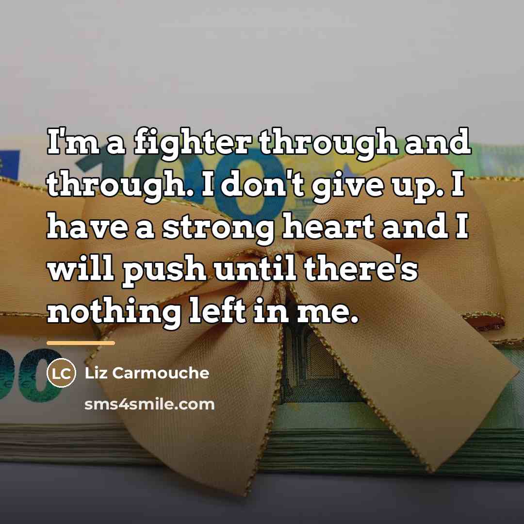 “I'm a fighter through and through. I don't give up.…” quote by Liz Carmouche
