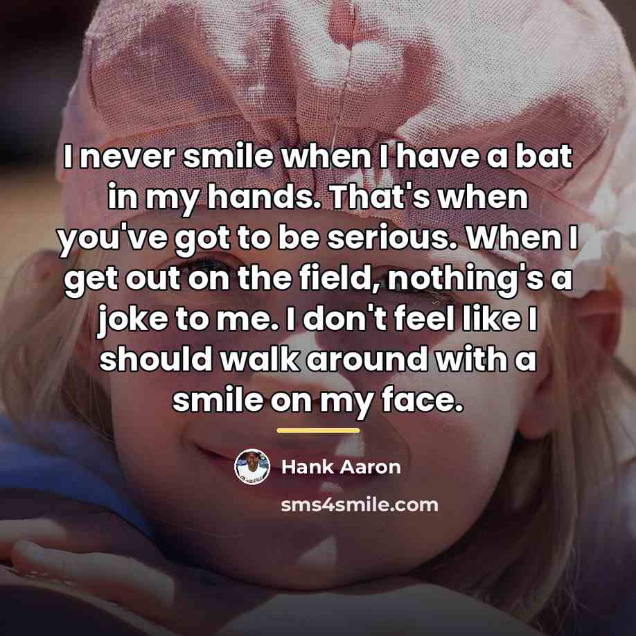 “I never smile when I have a bat in my…” quote by Hank Aaron