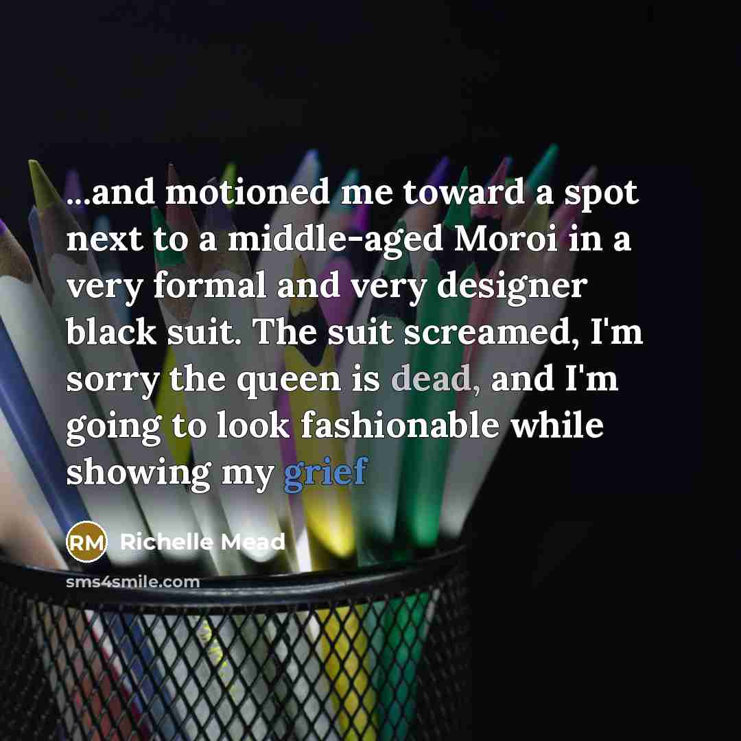 “...and motioned me toward a spot next to a middle-aged…” quote by Richelle Mead