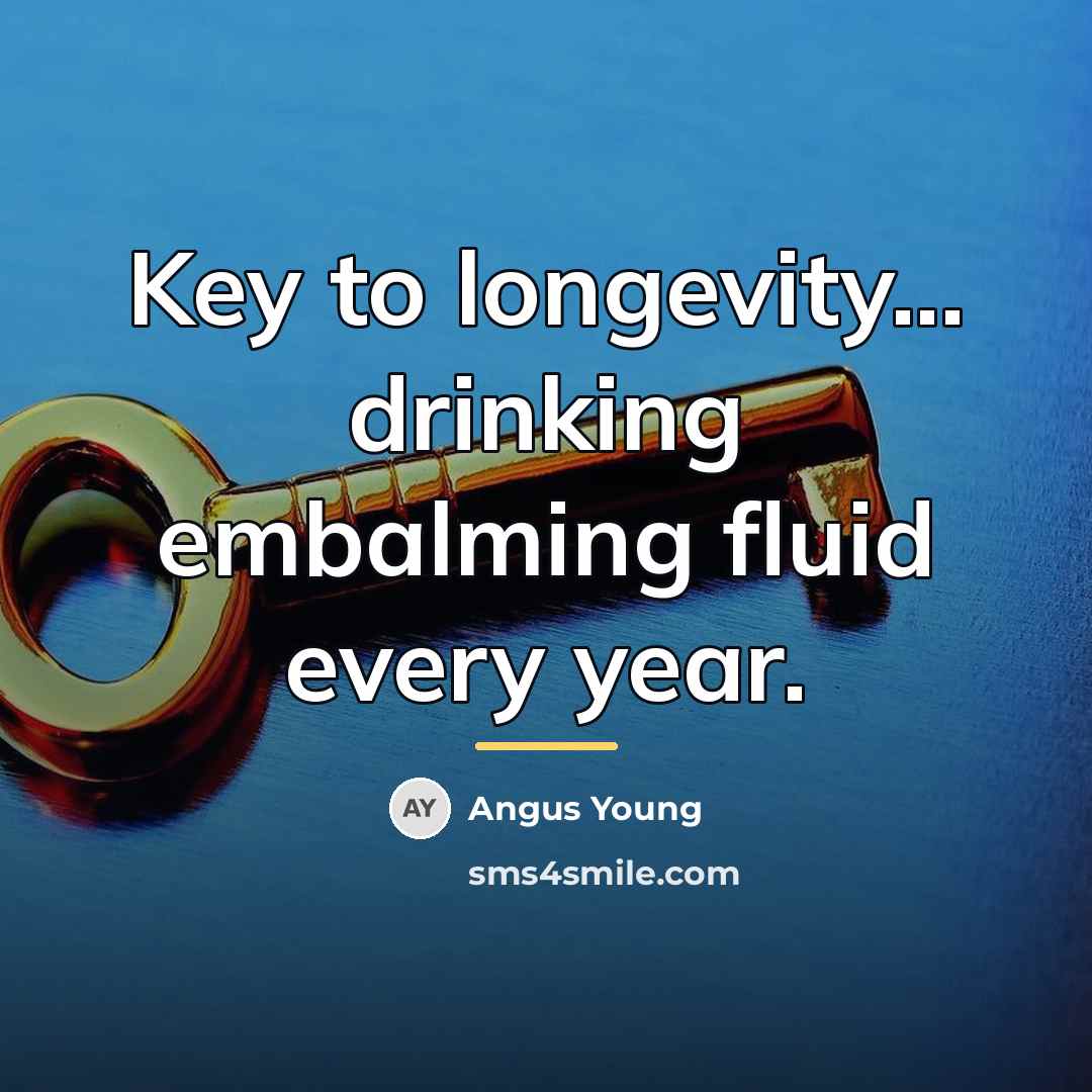 “Key to longevity... drinking embalming fluid every year.…” quote by Angus Young