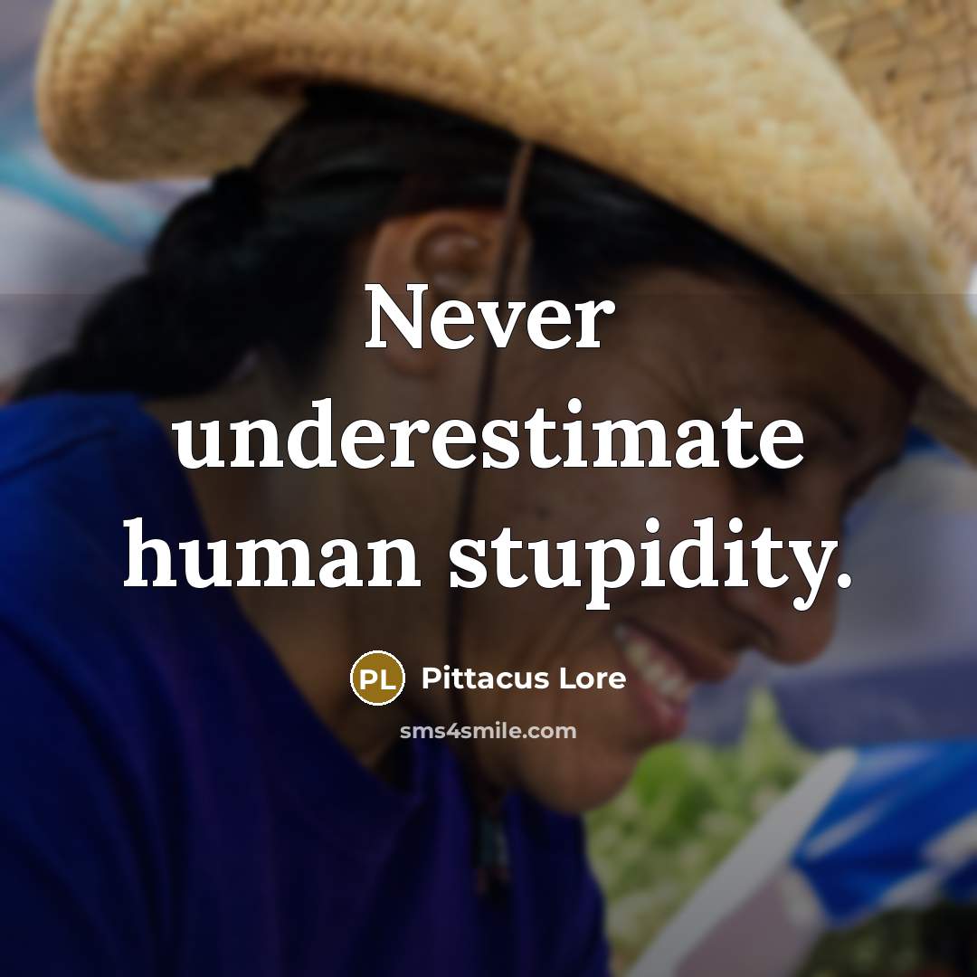 “Never underestimate human stupidity.…” quote by Pittacus Lore