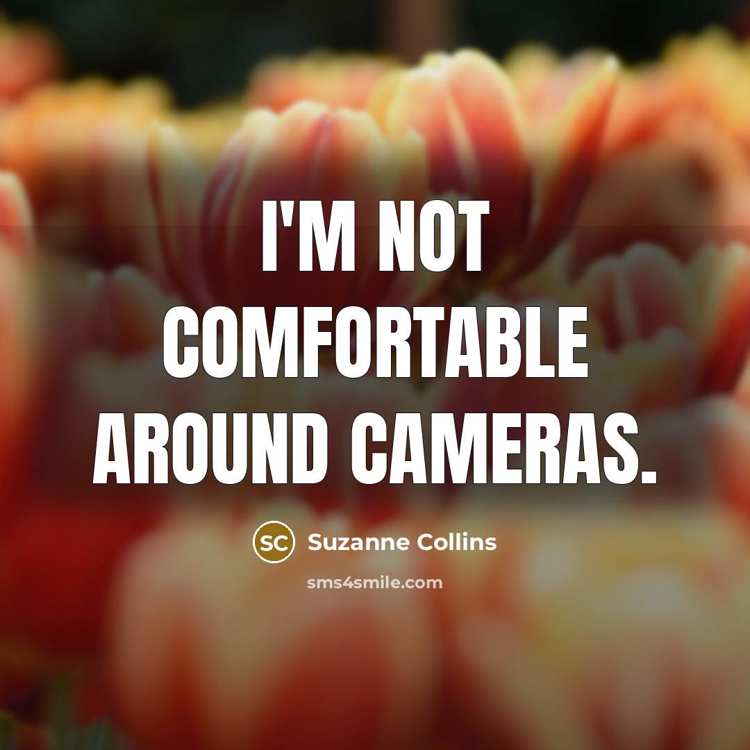 “I'm not comfortable around cameras.…” quote by Suzanne Collins