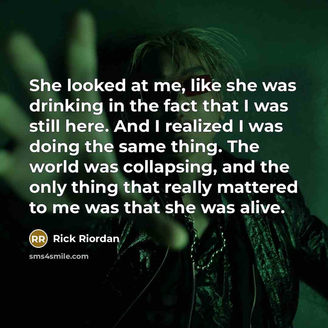 “She looked at me, like she was drinking in the…” quote by Rick Riordan