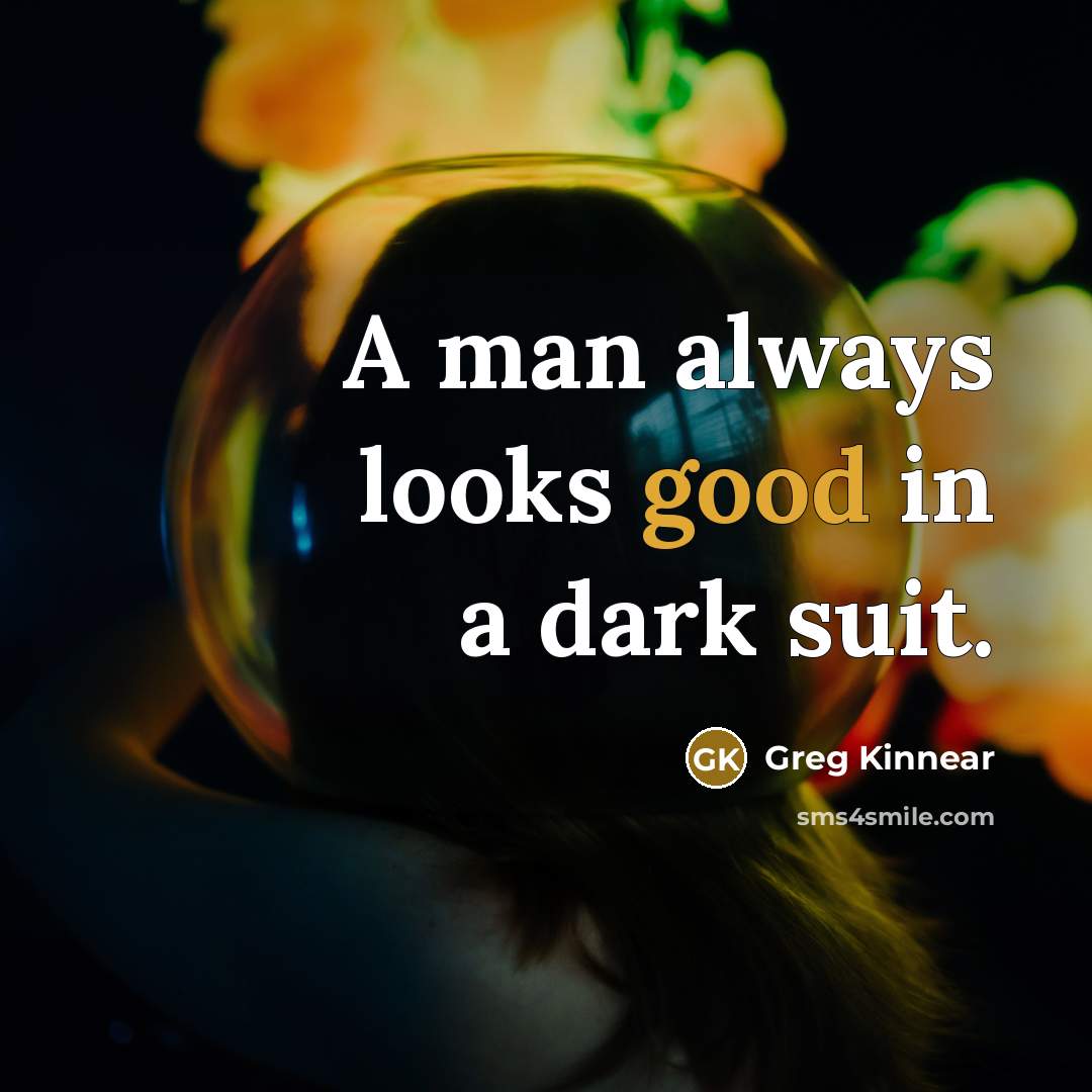 “A man always looks good in a dark suit.…” quote by Greg Kinnear