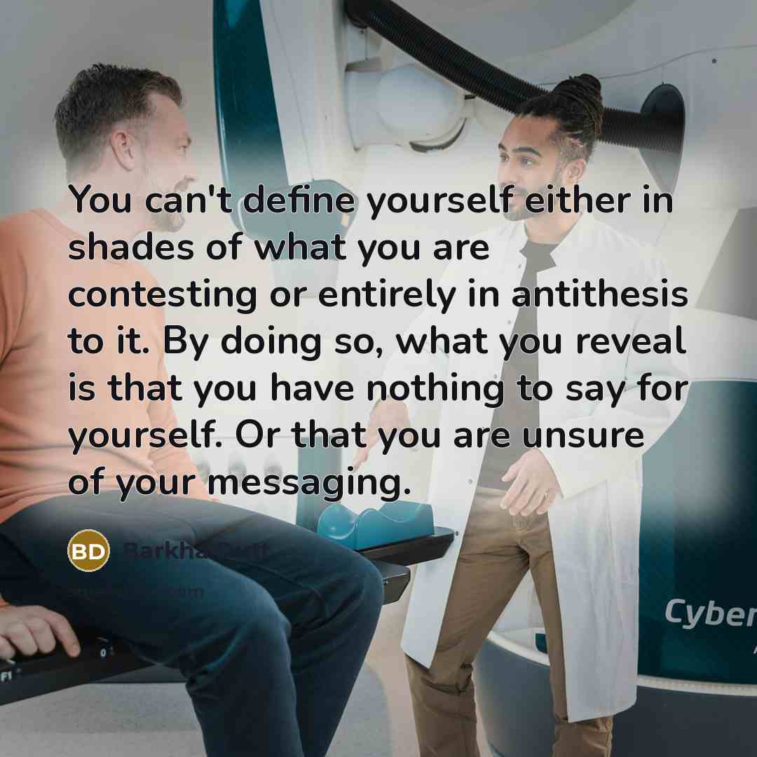 “You can't define yourself either in shades of what you…” quote by Barkha Dutt