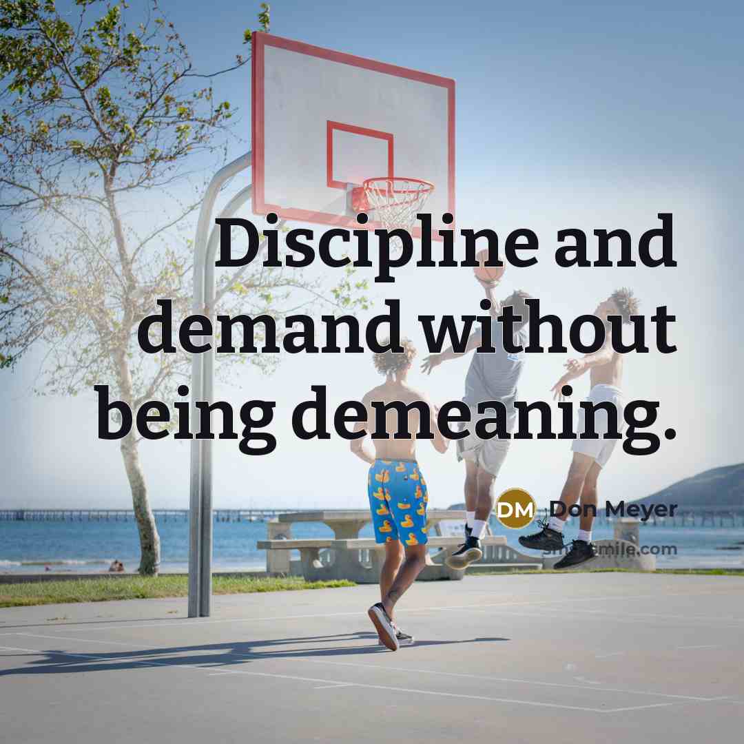 “Discipline and demand without being demeaning.…” quote by Don Meyer