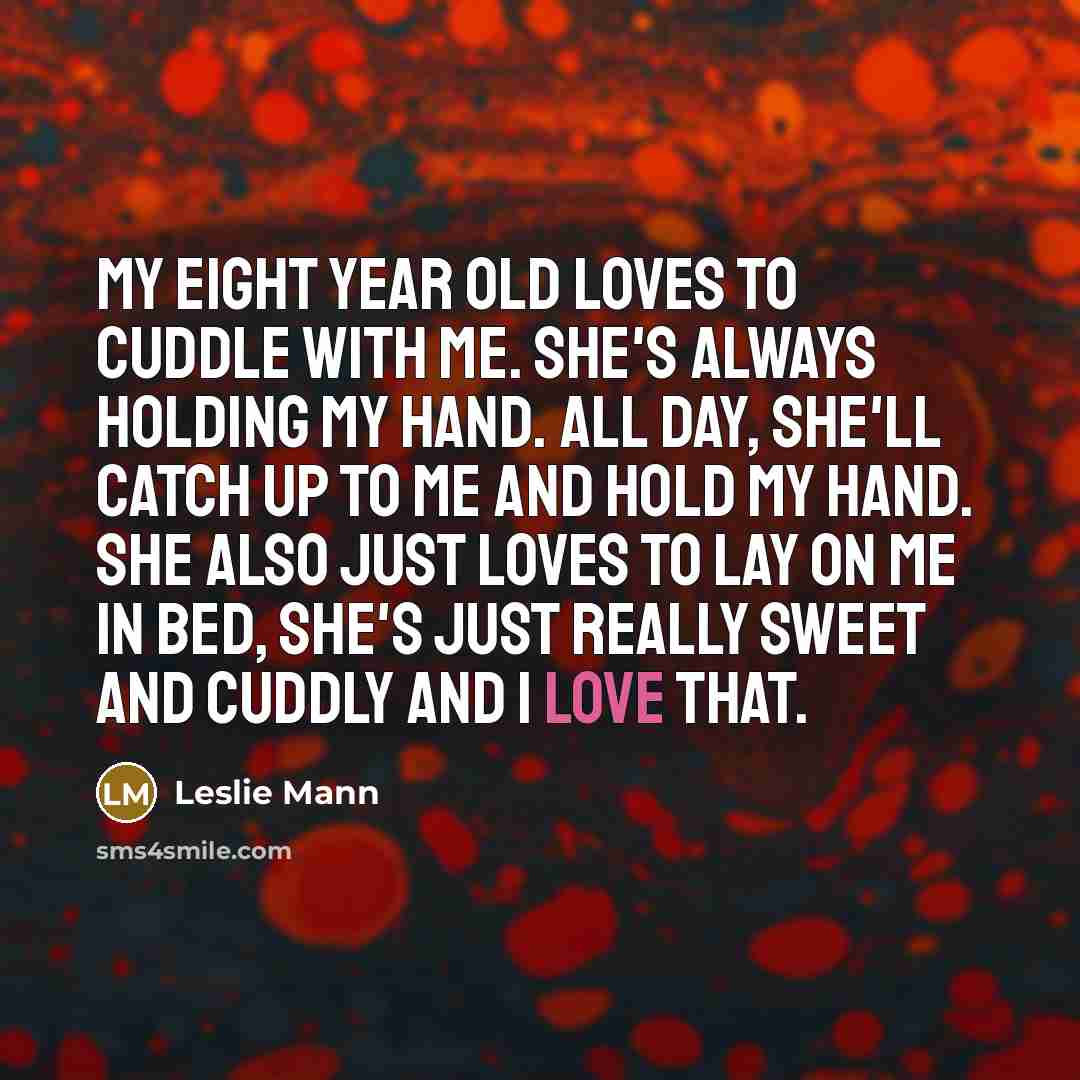 “My eight year old loves to cuddle with me. She's…” quote by Leslie Mann