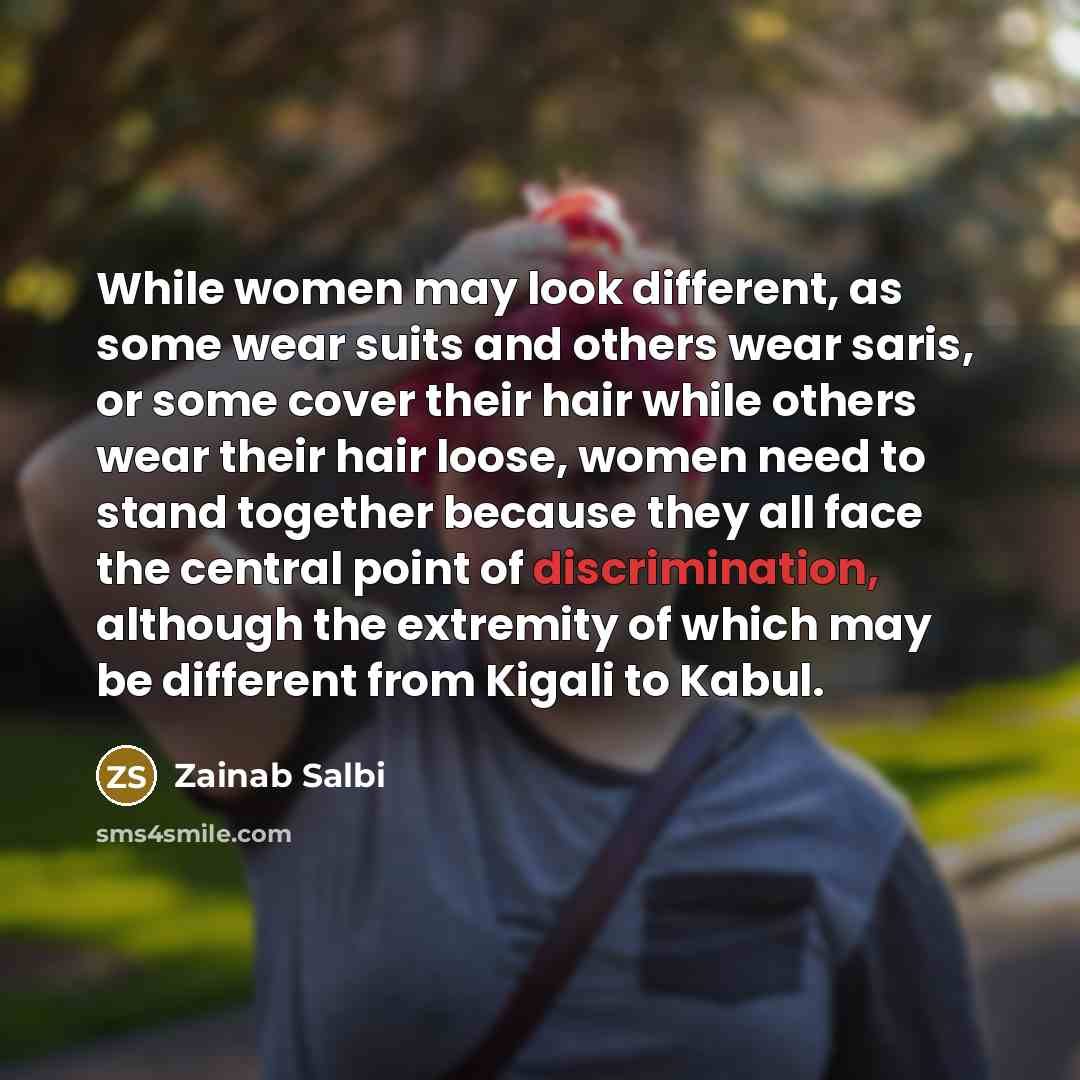 “While women may look different, as some wear suits and…” quote by Zainab Salbi