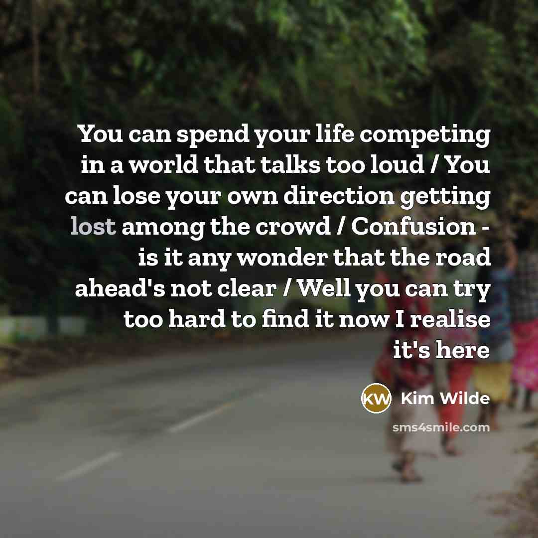 “You can spend your life competing in a world that…” quote by Kim Wilde