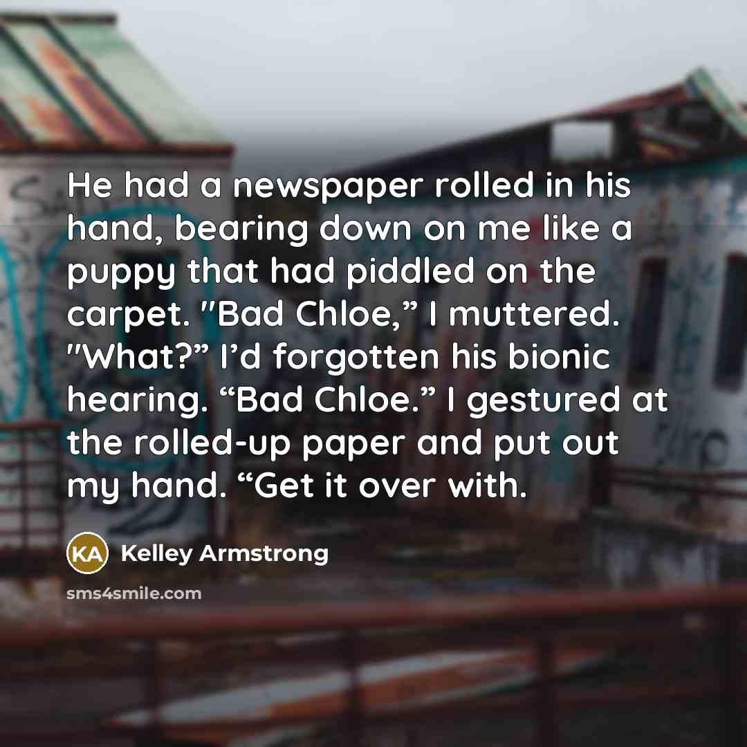 “He had a newspaper rolled in his hand, bearing down…” quote by Kelley Armstrong