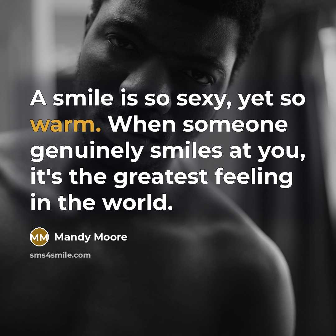 “A smile is so sexy, yet so warm. When someone…” quote by Mandy Moore