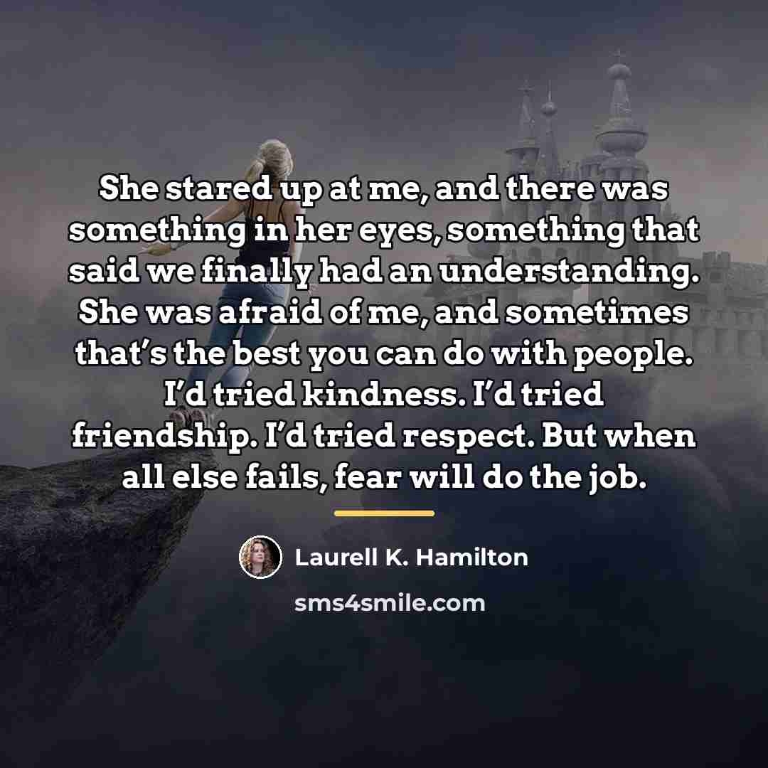 “She stared up at me, and there was something in…” quote by Laurell K. Hamilton