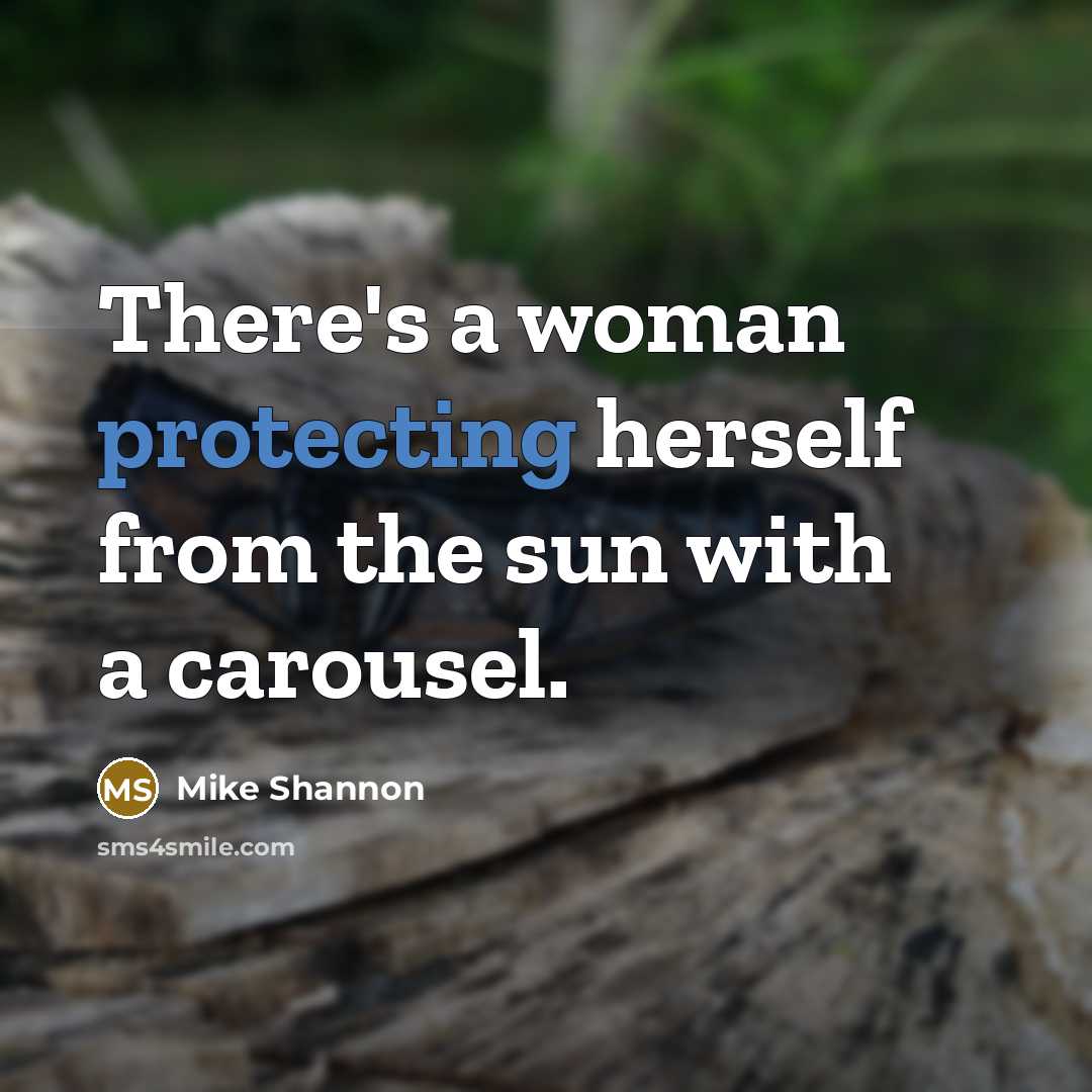 “There's a woman protecting herself from the sun with a carousel.” quote by Mike Shannon
