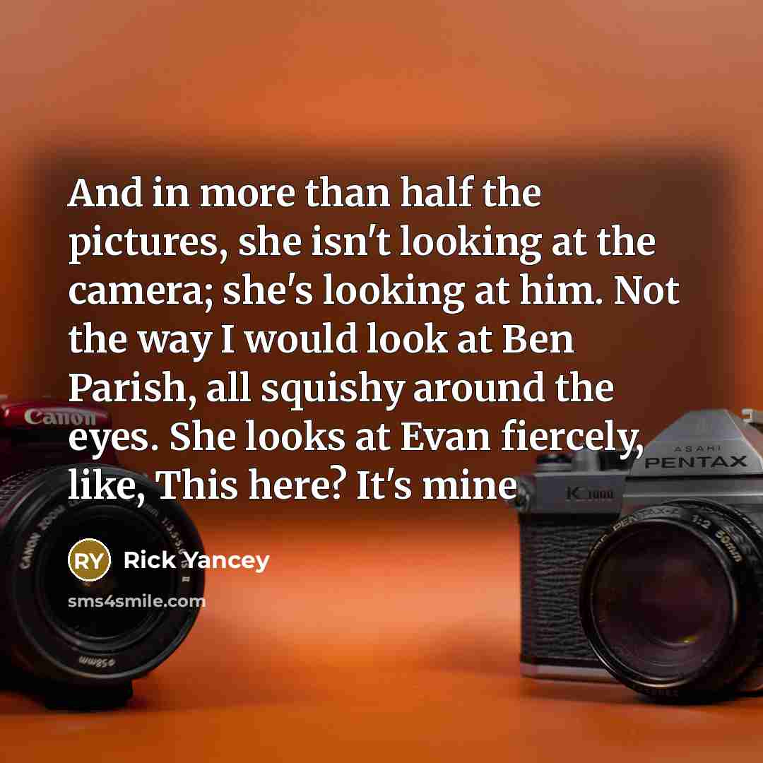 “And in more than half the pictures, she isn't looking…” quote by Rick Yancey