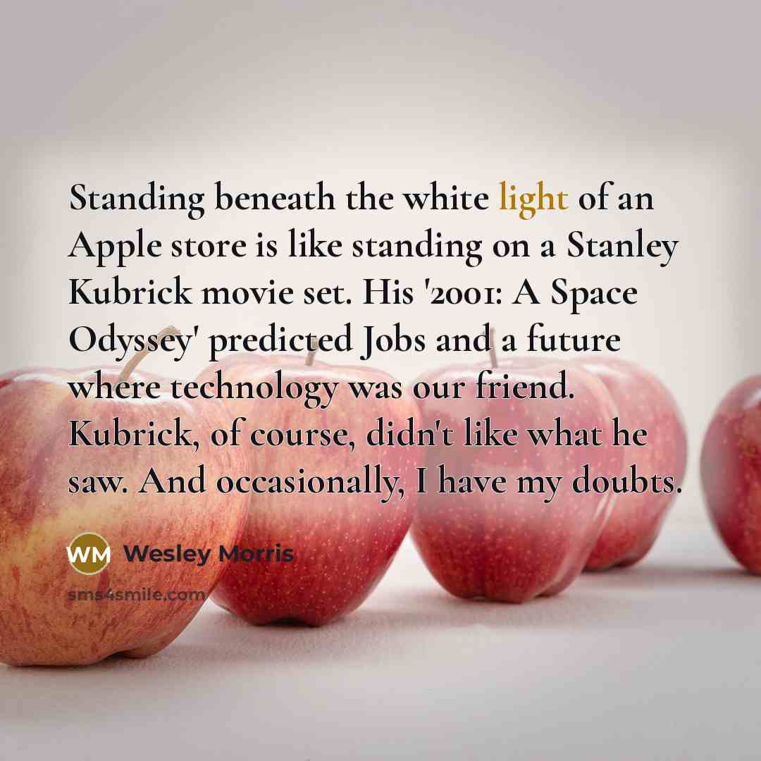 “Standing beneath the white light of an Apple store is…” quote by Wesley Morris