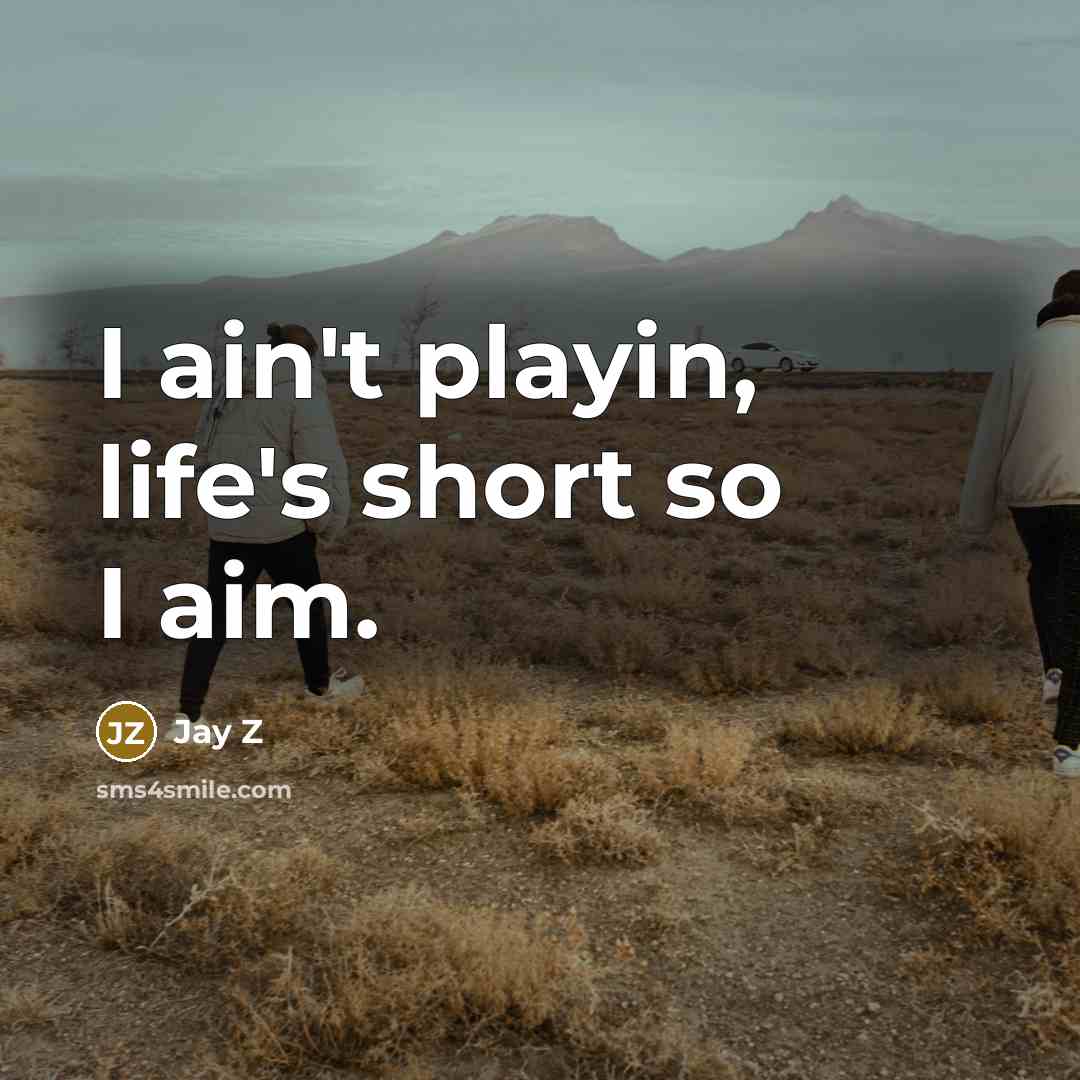 “I ain't playin, life's short so I aim.…” quote by Jay Z