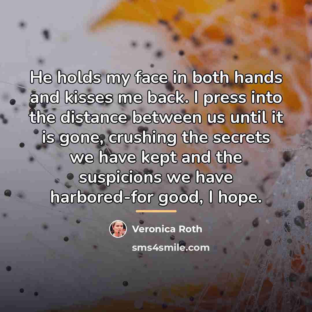 “He holds my face in both hands and kisses me…” quote by Veronica Roth