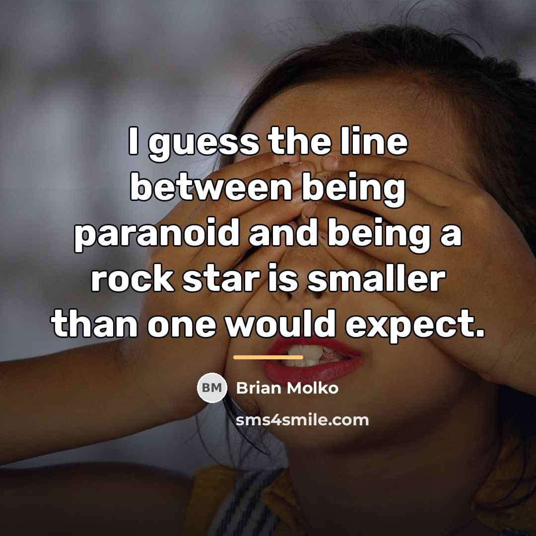 “I guess the line between being paranoid and being a…” quote by Brian Molko