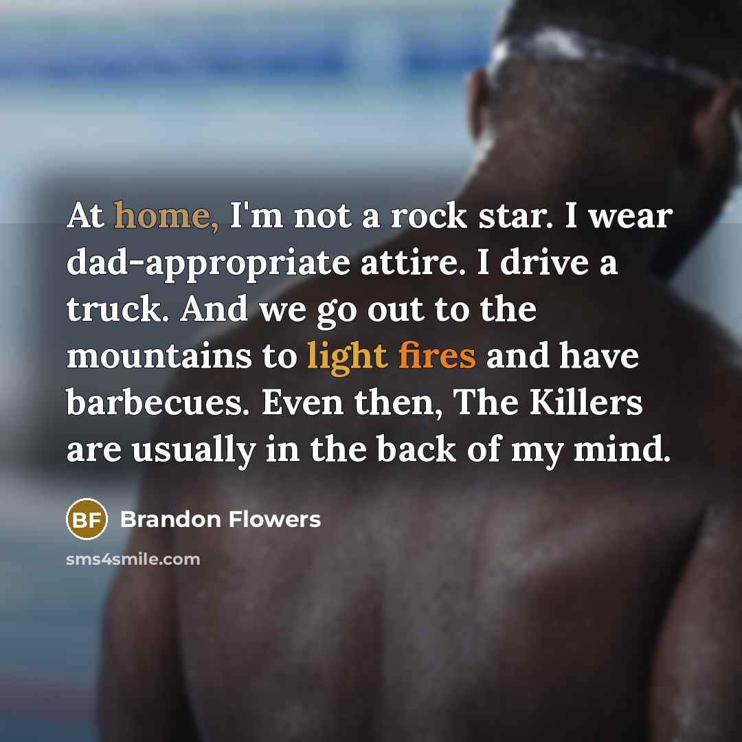 “At home, I'm not a rock star. I wear dad-appropriate…” quote by Brandon Flowers