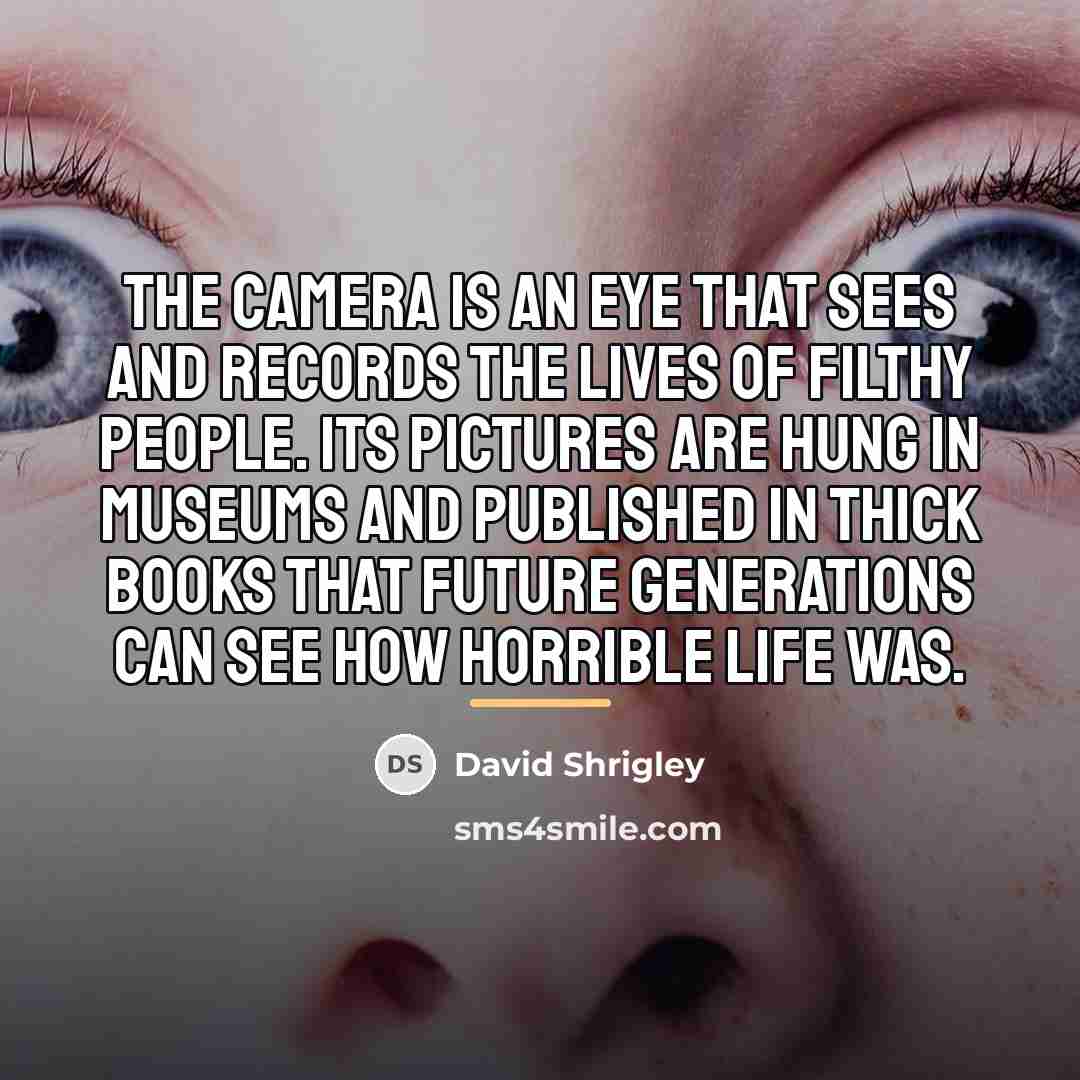 “The camera is an eye that sees and records the…” quote by David Shrigley