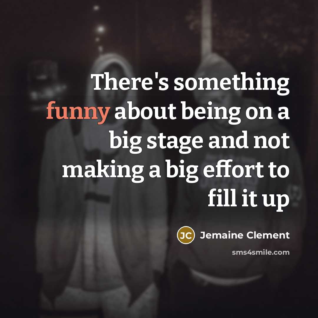 “There's something funny about being on a big stage and…” quote by Jemaine Clement