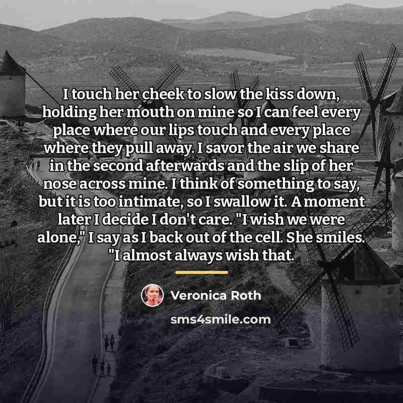 “I touch her cheek to slow the kiss down, holding…” quote by Veronica Roth