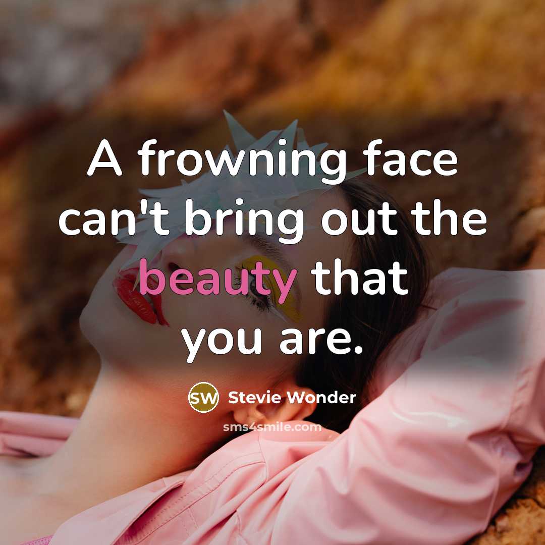 “A frowning face can't bring out the beauty that you…” quote by Stevie Wonder