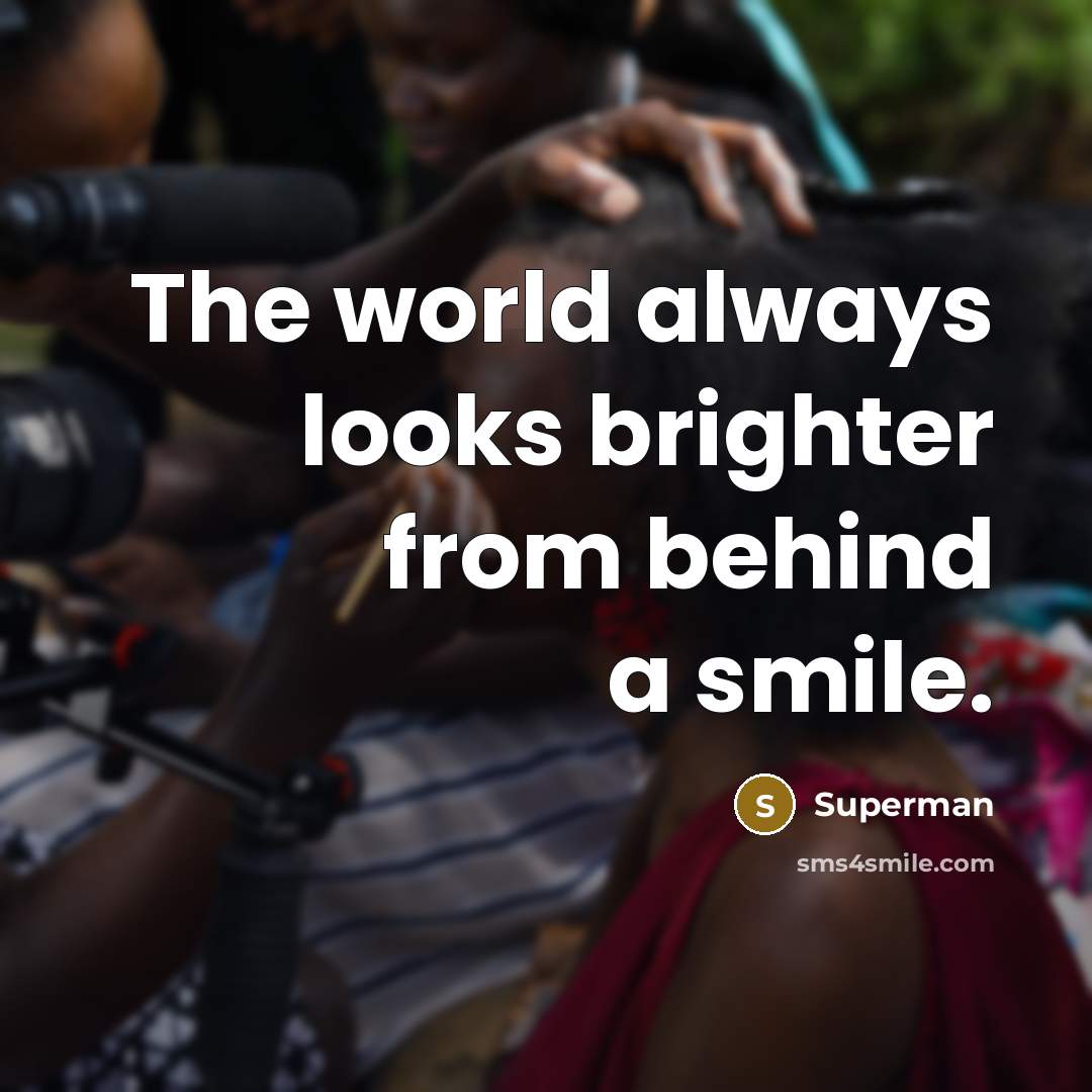 “The world always looks brighter from behind a smile.…” quote by Superman
