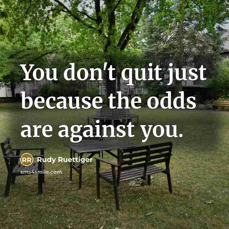 “You don't quit just because the odds are against you.…” quote by Rudy Ruettiger